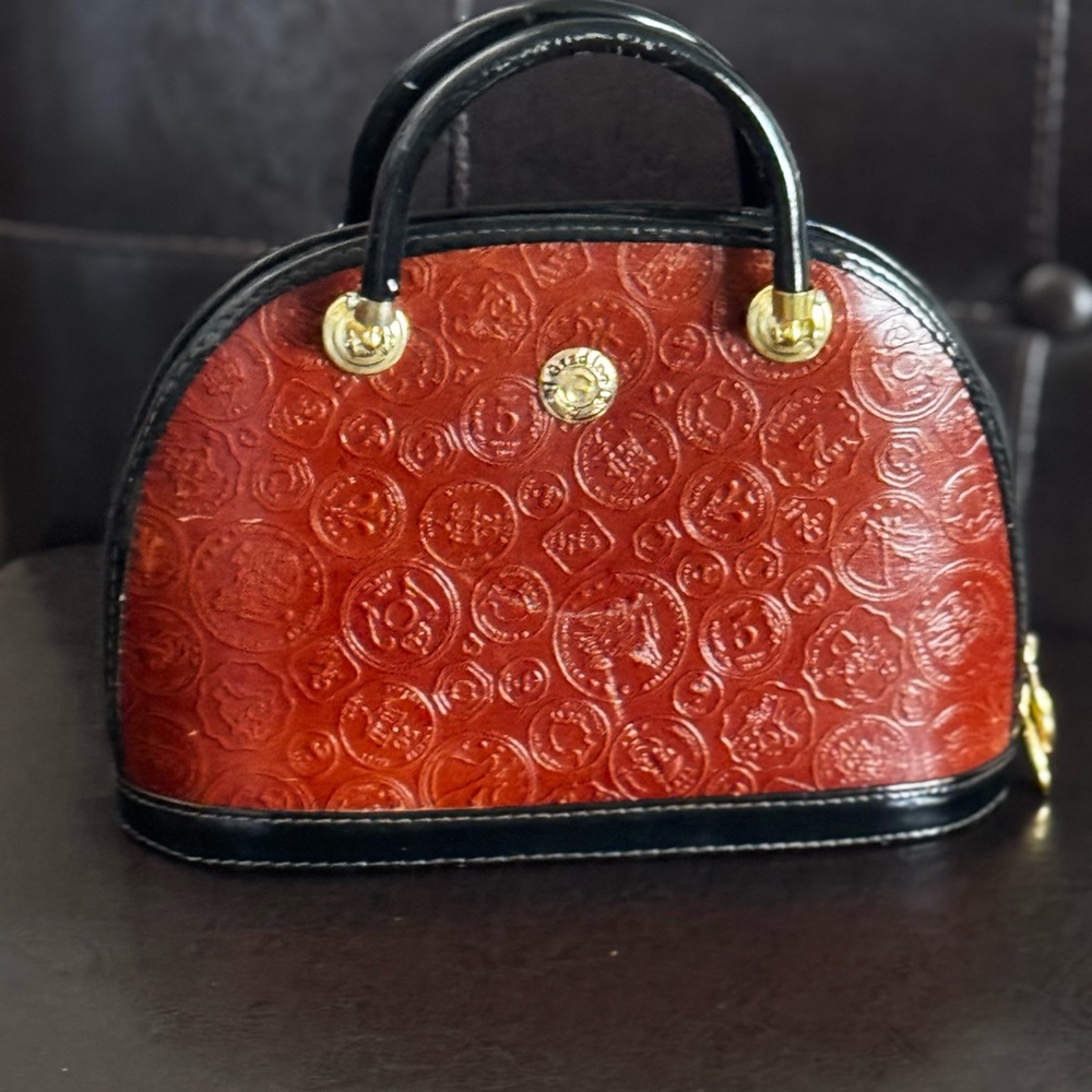 Elegant Red and Black Embossed Handbag
